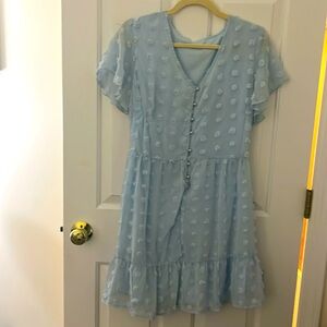 Blue short sleeved dress with textured Pom poms